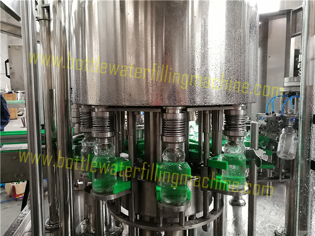 Capacidad de relleno del equipo 3000b/h del casquillo del jugo de aluminio de la botella de cristal 1